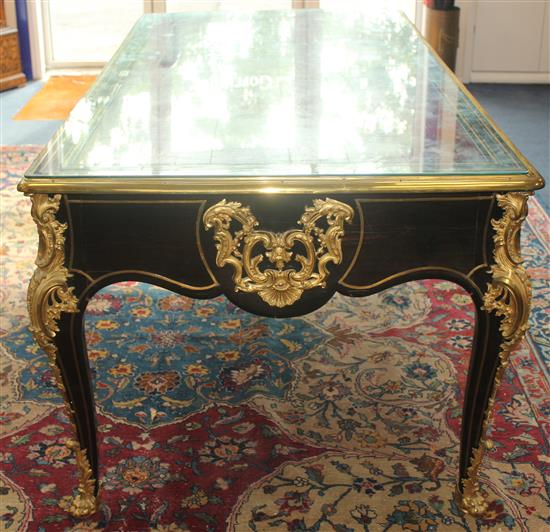 An early Louis XV brass inlaid ebony veneered bureau plat, W.6ft 6in. H.2ft 7.5in.